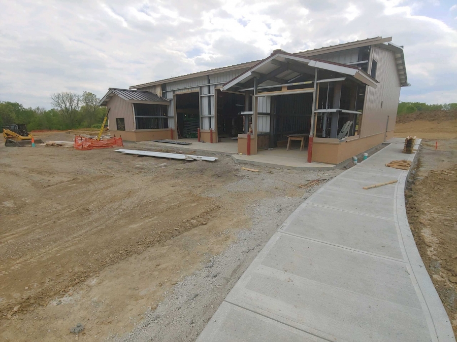 finished sidewalk with freshly poured concrete